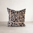 PeeKay Linen Cushion — abstract brushstroke print in midnight and black on shell linen