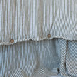 Coastalis Living + Design French Linen Quilt Cover in Olive Pencil Stripe coconut button detail