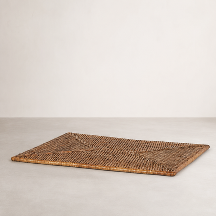 Rectangular rattan placemat in antique brown with fine parallel rows and mitred corners