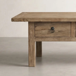 Leo Reclaimed Elm Coffee Table — raw-finished elm surface with visible grain texture