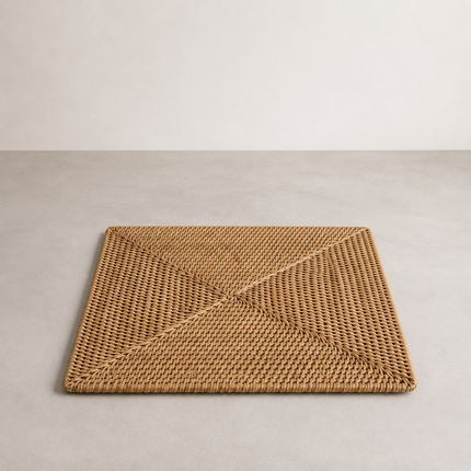 Square rattan placemat with raised ribs running from each corner into the centre
