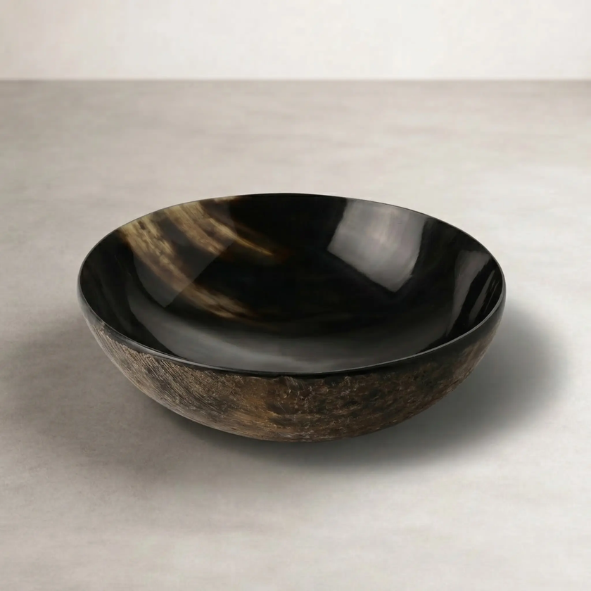Polished Horn Bowl — hand-polished buffalo horn shifting from deep black to amber