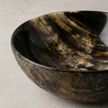Polished Horn Bowl — translucent natural horn bowl with honey and black tonal layers