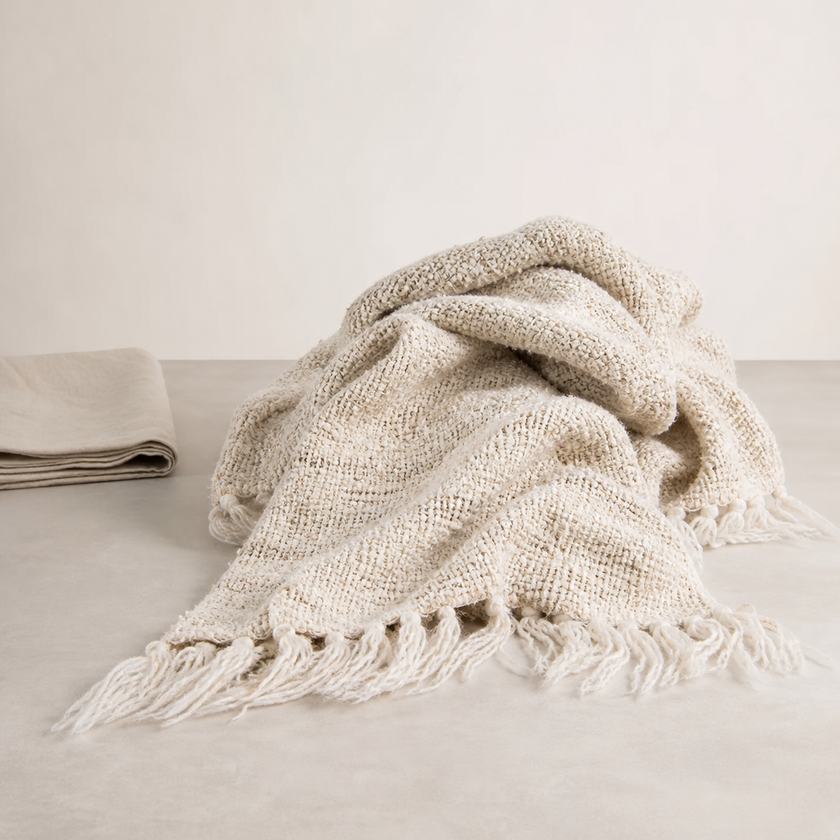 Wabi Throw — open irregular weave in soft ivory
