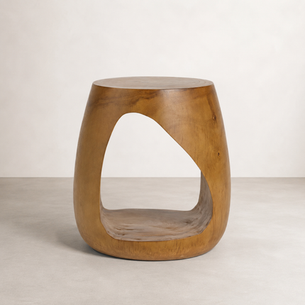 Cove Side Table — solid suar drum with a carved arched opening
