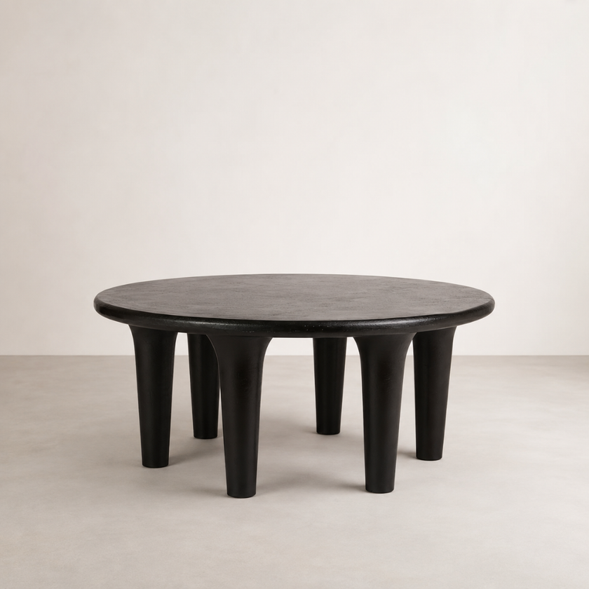 Mesa Coffee Table — low round cast aluminium top on five stout legs