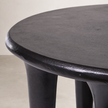 Mesa Coffee Table — matte black surface taking in the light