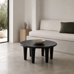 Mesa Coffee Table — five thick tapered legs splayed like columns