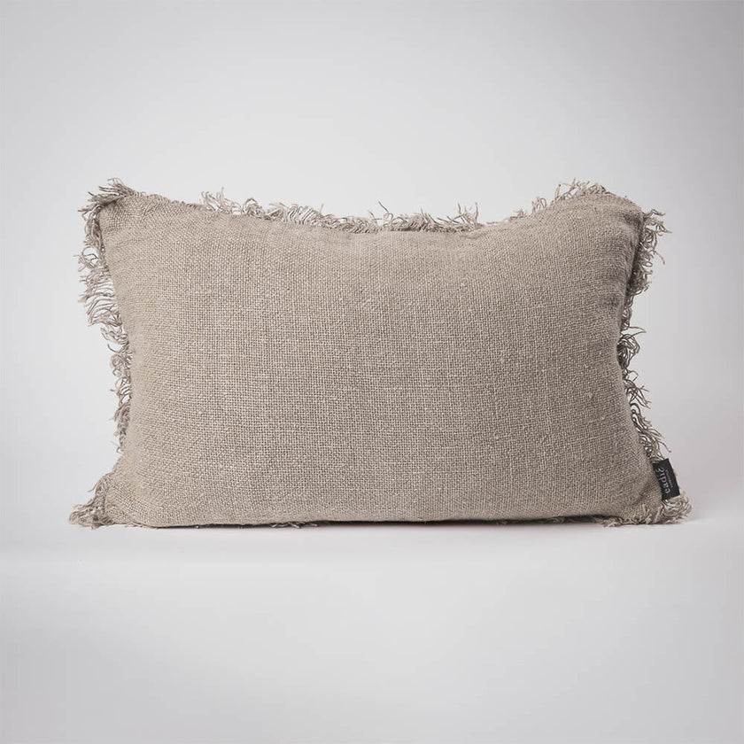 Coastalis Living + Design Bedouin Linen Lumbar Cushion in Natural front view with fringed edges