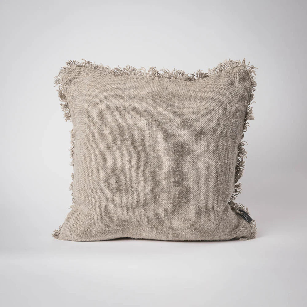 Coastalis Living + Design Bedouin Linen Cushion in Natural, square with frayed fringe edges