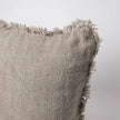 Coastalis Living + Design Bedouin Handwoven Linen Cushion in Natural, close-up of corner with frayed fringe
