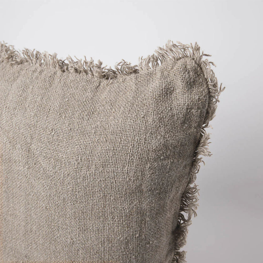 Coastalis Living + Design Bedouin Handwoven Linen Cushion in Natural, close-up of corner with frayed fringe