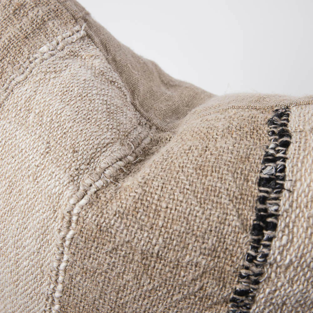 Retreat Linen Cushion — feather-filled cushion in striped cotton-linen