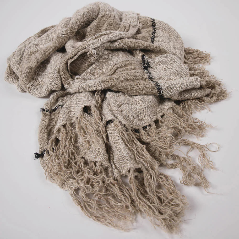 Retreat Linen Throw — open irregular weave with real weight and drape