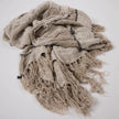 Retreat Linen Throw — open irregular weave with real weight and drape
