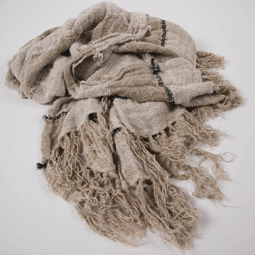 Retreat Linen Throw — open irregular weave with real weight and drape