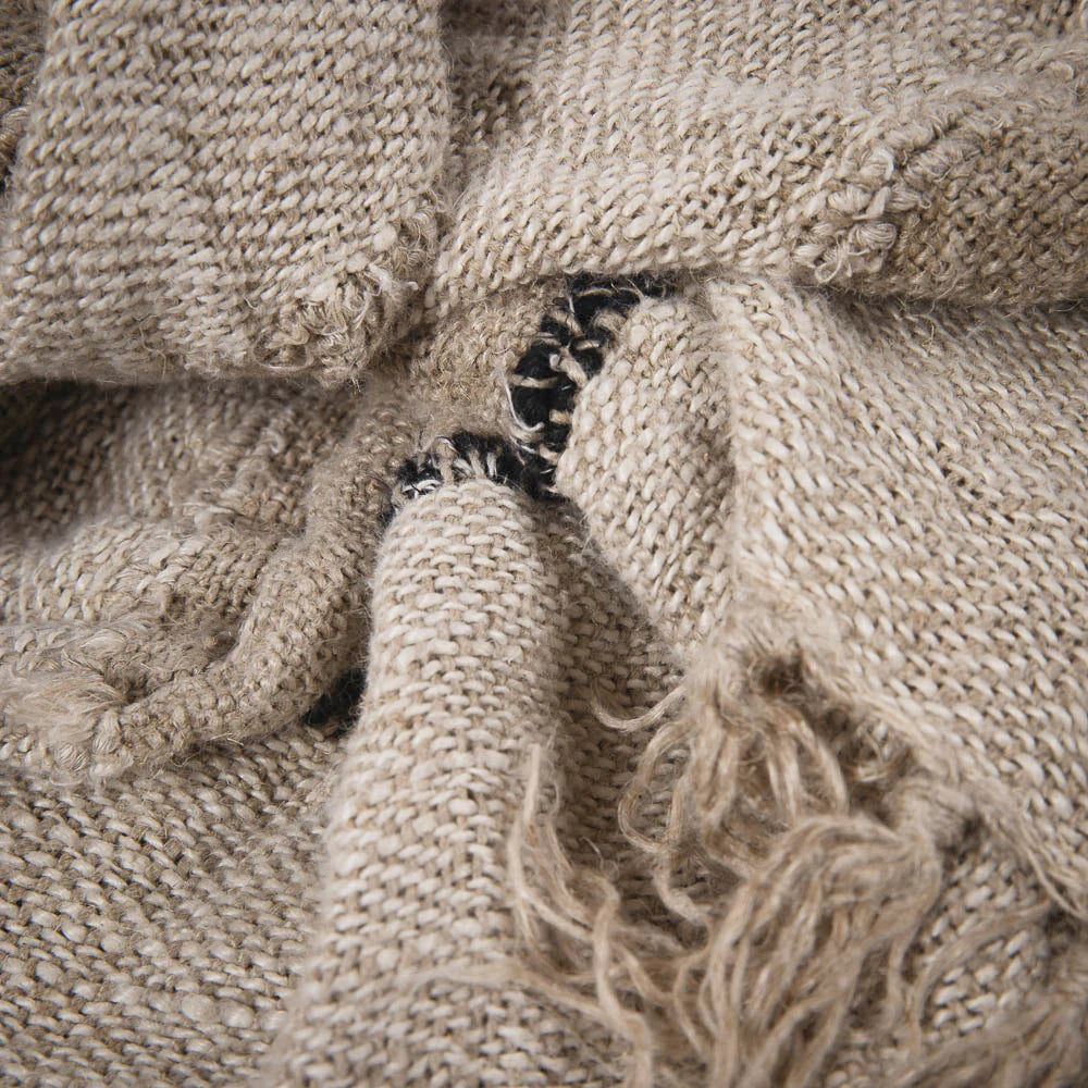 Retreat Linen Throw — natural, ivory and black stripes across a relaxed weave