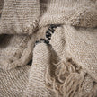 Retreat Linen Throw — natural, ivory and black stripes across a relaxed weave