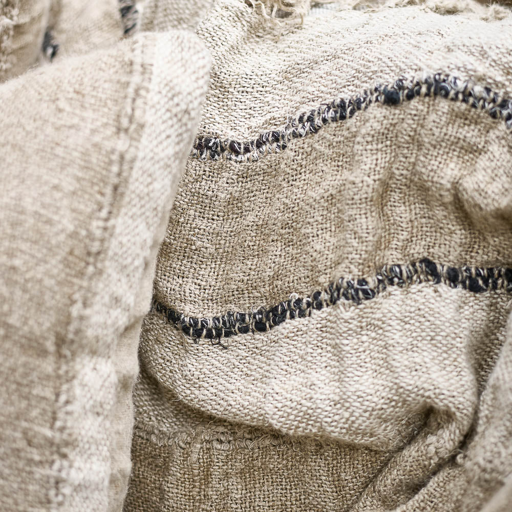 Retreat Linen Throw — quietly graphic stripes finished with tasselled short ends