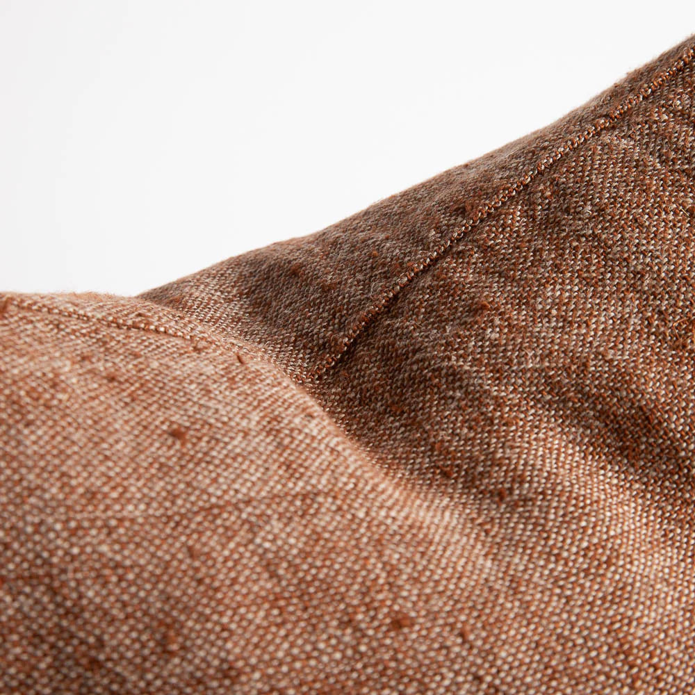 Tabako Linen Cushion — close-up of the textured tobacco linen weave and frayed edge