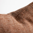 Tabako Linen Cushion — close-up of the textured tobacco linen weave and frayed edge