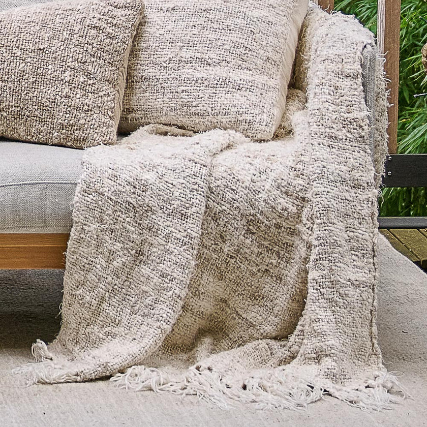 Wabi Throw — hand-spun ivory linen with natural surface variation