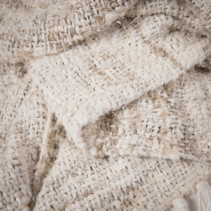 Wabi Throw — ivory reclaimed linen holding its chunky shape
