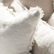 Coastalis Living + Design Bedouin Cushion in Ivory close-up of rustic linen weave and fringed edge detail