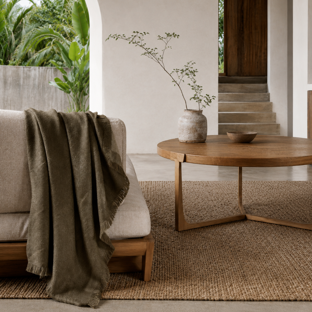 Faro Throw - Olive — olive shifting subtly through the wool weave