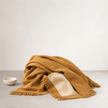 Faro Throw - Toffee — loosely knotted fringe along the edge