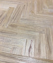 Cinquant Reclaimed Elm Coffee Table — close detail of the herringbone reclaimed elm top