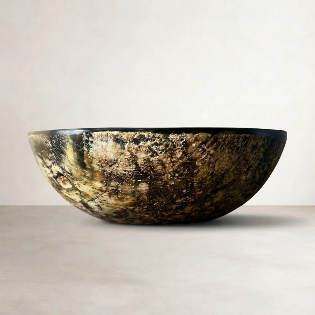 a textured polished bowl made from buffalo horn