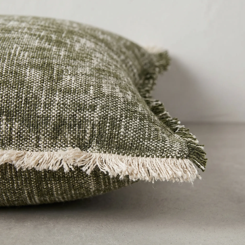 Sero Cotton Cushion — textured slub cotton with shifting olive colour