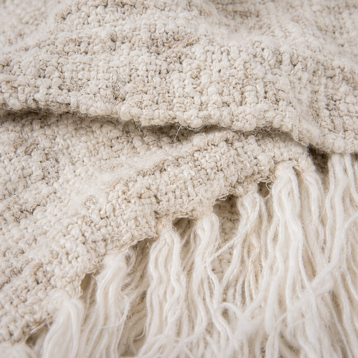 Wabi Throw — substantial ivory knit that holds its shape