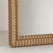 Anda Wall Mirror — 77cm carved timber frame in a natural finish