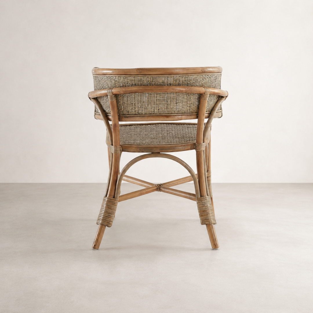 Cana Dining Chair — hand-finished rattan frame in mud grey