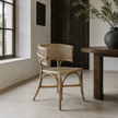 Cana Dining Chair — mud-grey wash showing the natural rattan grain