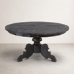 Caribbean Round Dining Table — hand-carved scrolled base under the round top