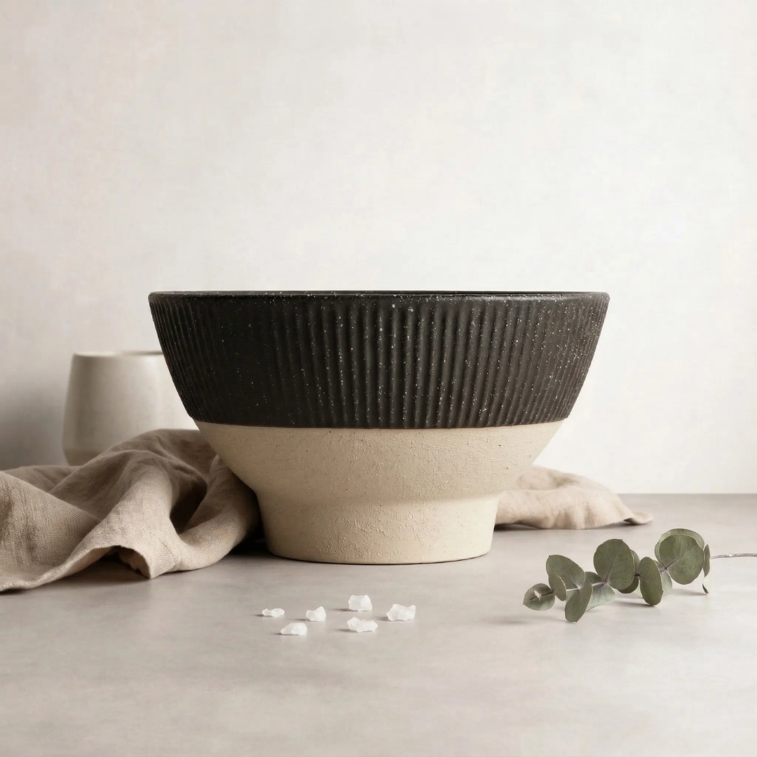 Eko Ceramic Bowl — black ceramic bowl with subtle firing variation across the surface