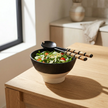 Eko Ceramic Bowl — low wide-mouthed serving bowl in matte black ceramic