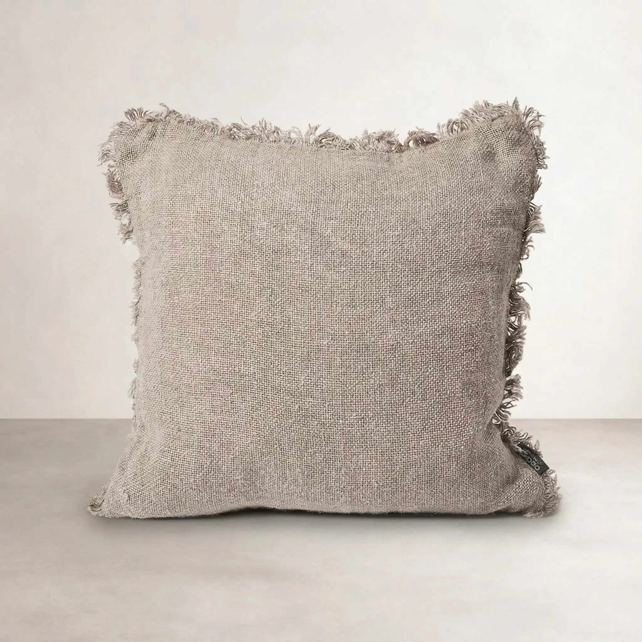 Coastalis Living + Design Bedouin Cushion in Natural, square handwoven linen with frayed fringe on all edges