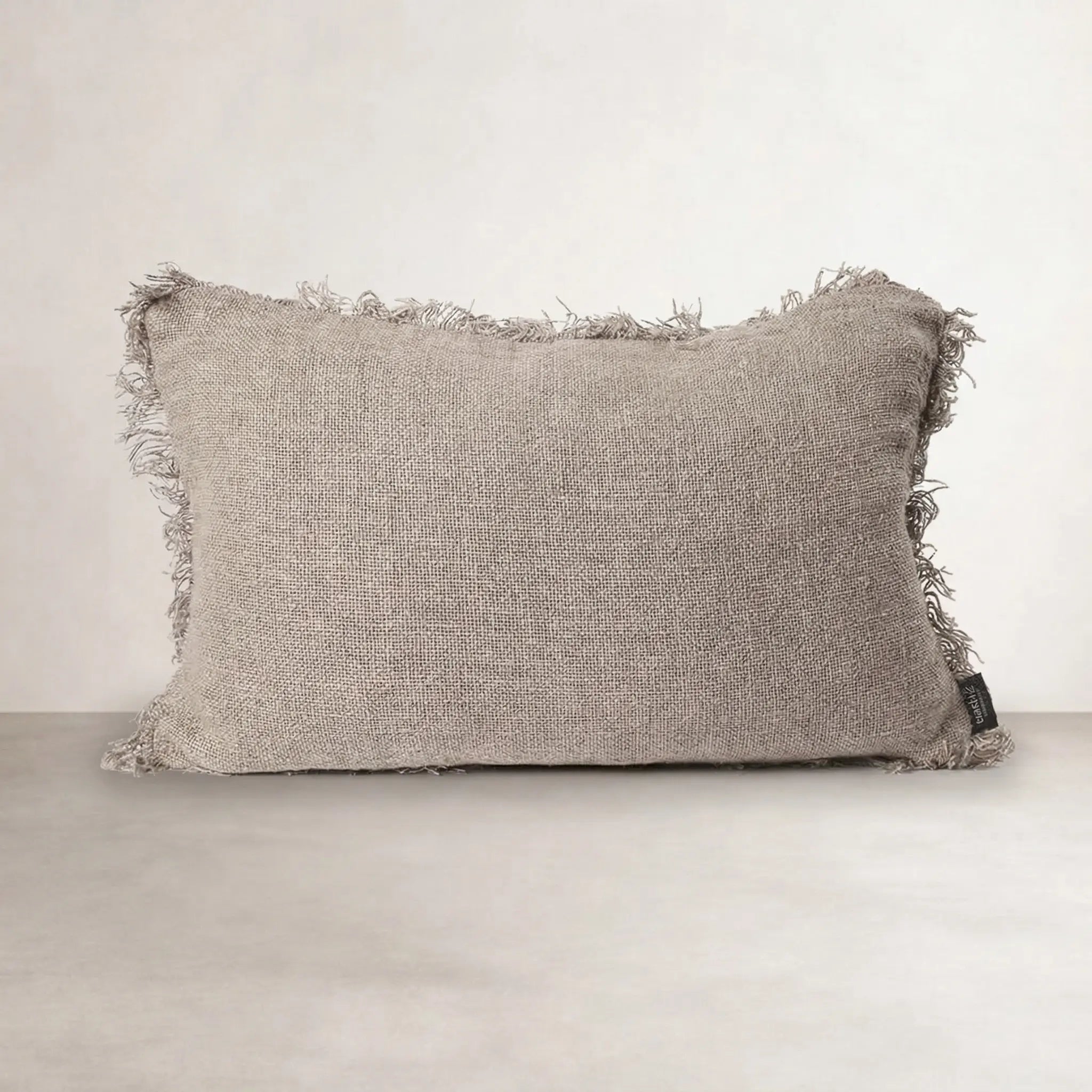 Coastalis Living + Design Bedouin Linen Lumbar Cushion in Natural with fringed edges