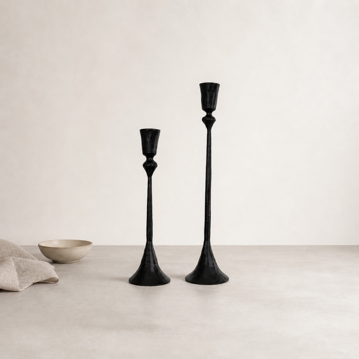 Nyx Forged Iron Candle Stands — slender tapering iron stands styled with minimal props