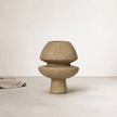 Dori Vessel - Clay — warm uncoated clay finish with visible texture
