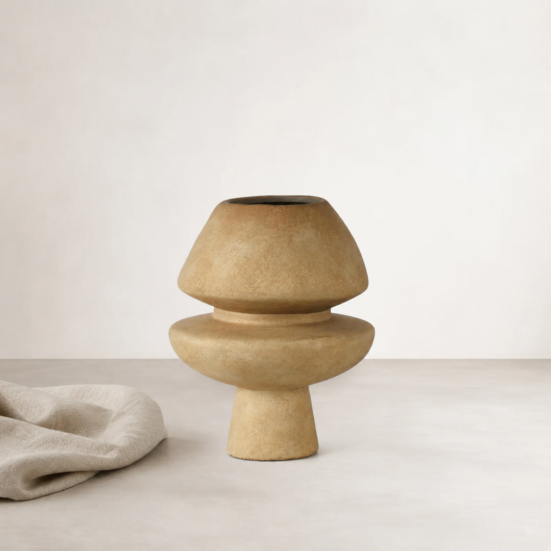 Dori Vessel - Clay — flared plinth base beneath a rounded cap