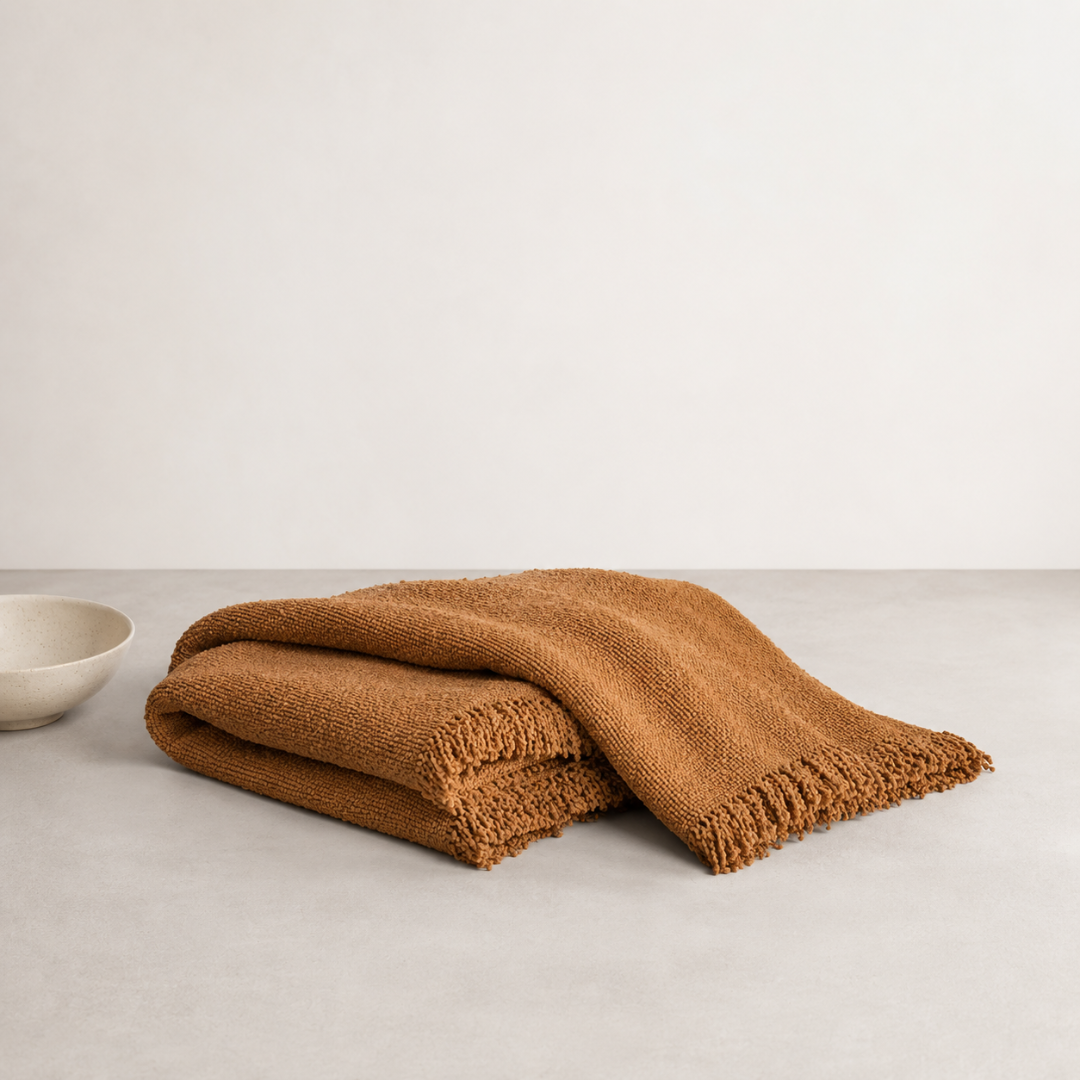 Lido Throw - Toffee — looped boucle texture pulling the colour deeper