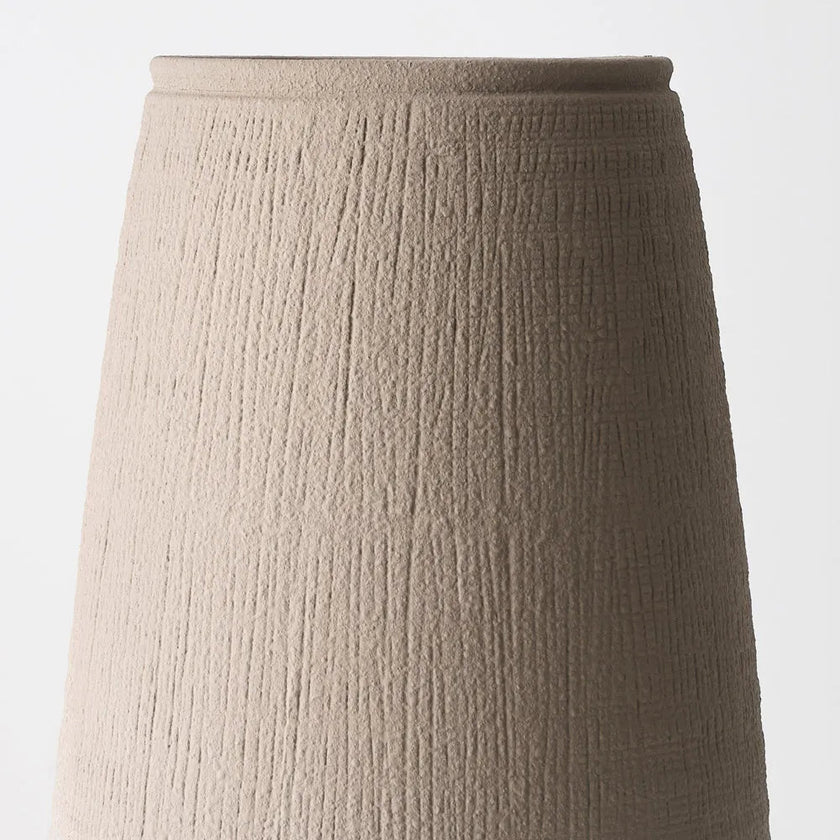 Sola Pot — hand-finished clay vessel with fine vertical cross-hatching