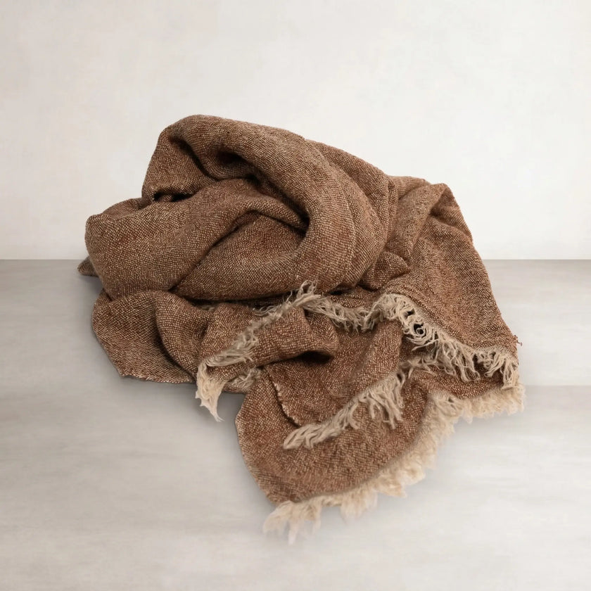 Tabako Linen Throw — scrunched tobacco linen showing the textured weave and frayed edge