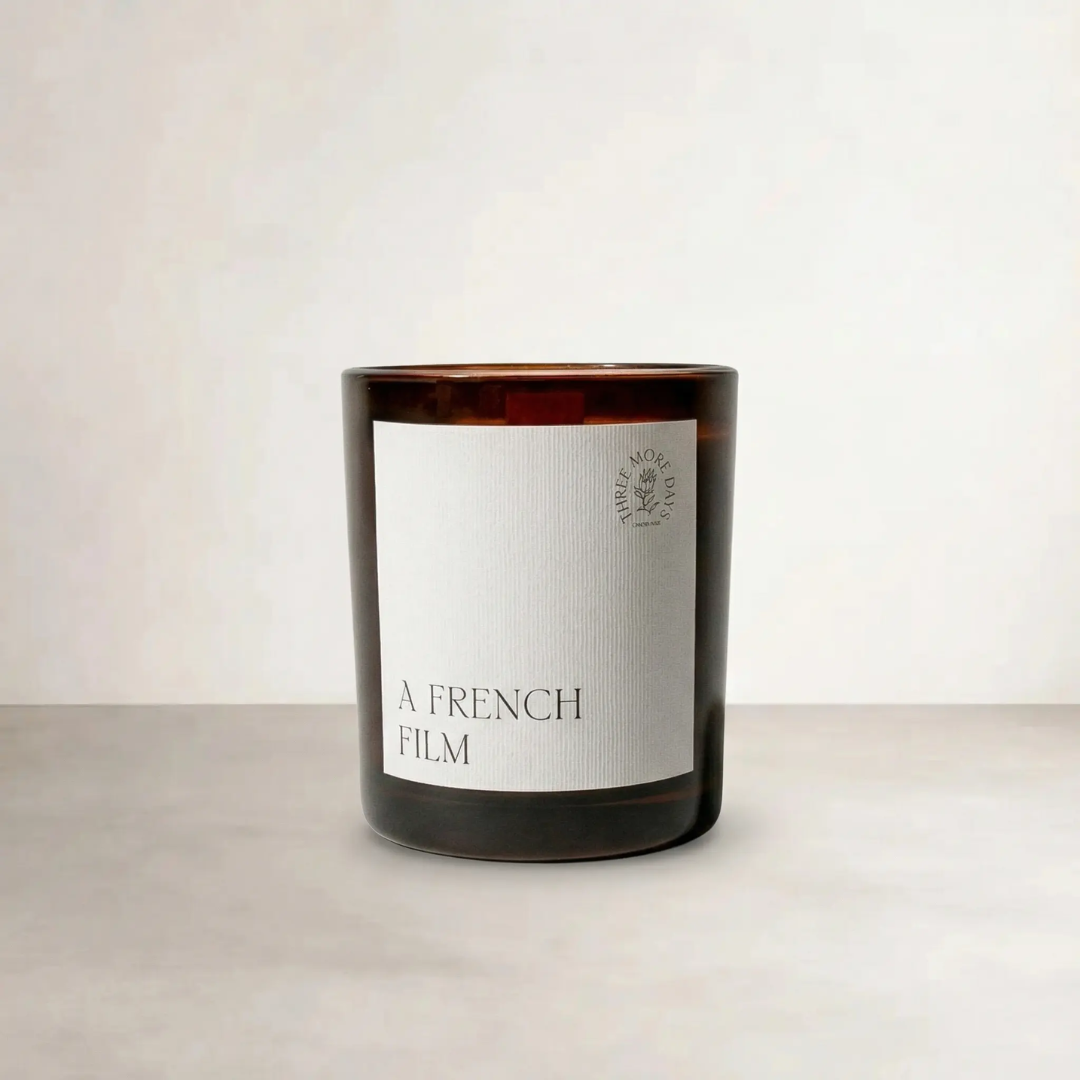 A French Film Candle — soy wax candle with wooden wick in weighted amber glass jar