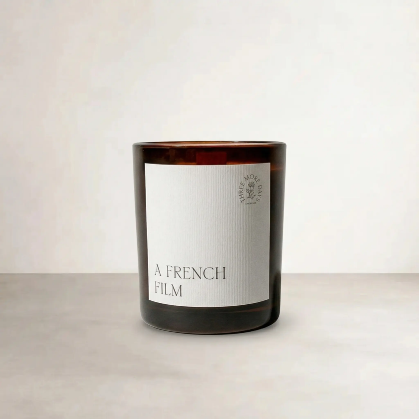 A French Film Candle — soy wax candle with wooden wick in weighted amber glass jar